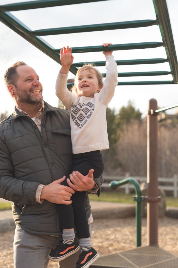 Young children may need support with reaching monkey bars